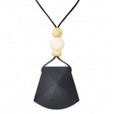 Necklace with a black pendant and three beads on a white background