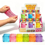 Colorful fidget cubes with 'Chilly Cube' branding and a hand interacting with one of them.