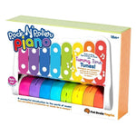 Rock N Roller Piano toy by Fat Brain Toy Co. in its original packaging, featuring a colorful wooden box with a visible rainbow piano inside.