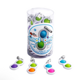 Clear container with colorful 'simplidimp' toys and keychains on a white background