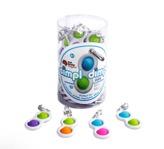 Clear container with colorful 'simplidimp' toys and keychains on a white background